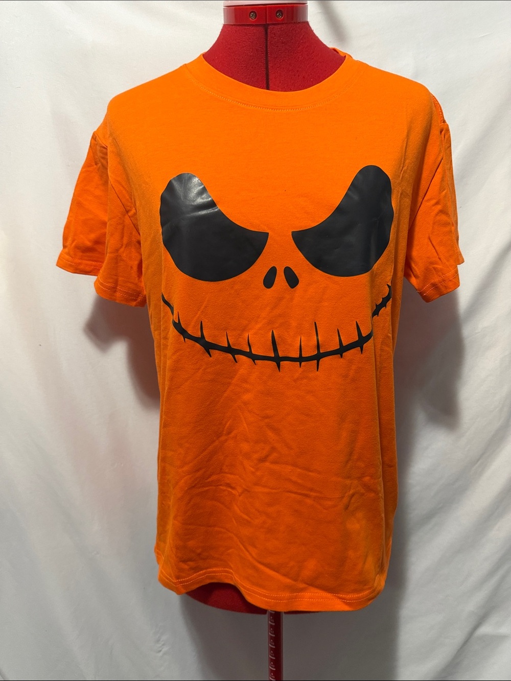 Women's Orange Short Sleeve Tee with Black Jack-O'-Lantern Face